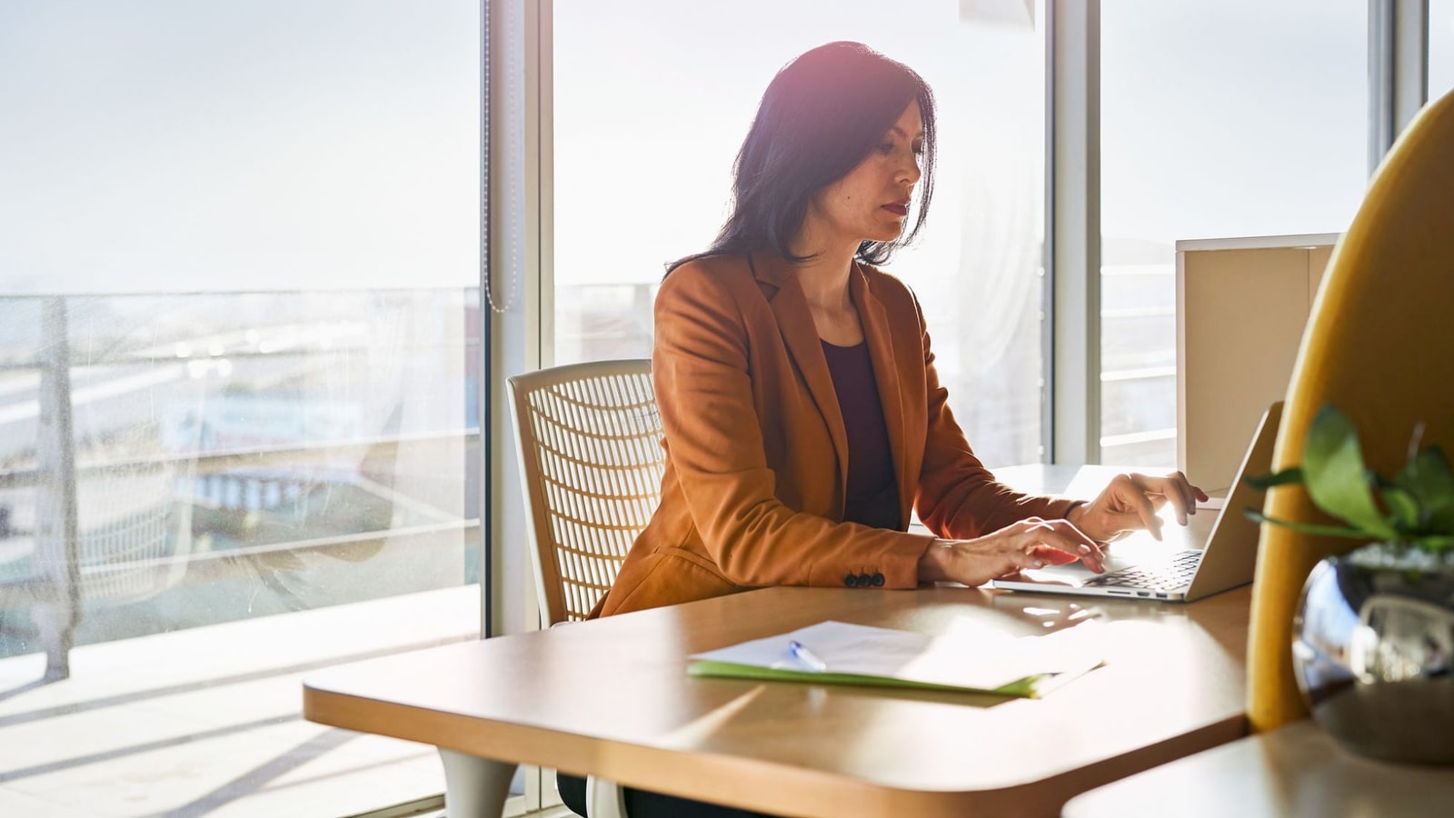 UBS investment-banking professional working in an office.