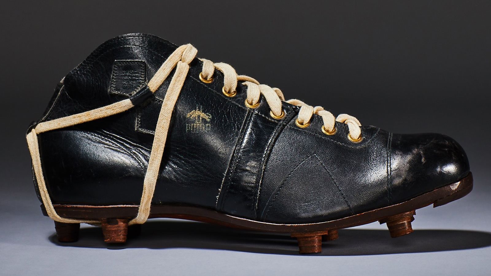 Historic Puma Atom football boot from the official Puma timeline.