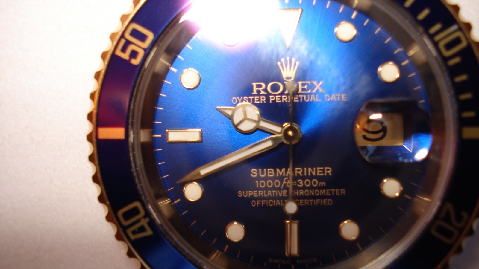 Rolex Oyster Perpetual Date Submariner watch.