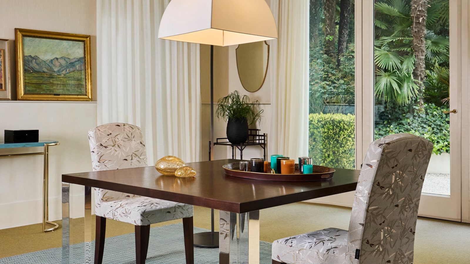Armani Casa interior with furniture, textiles, lighting, and a restrained material palette.