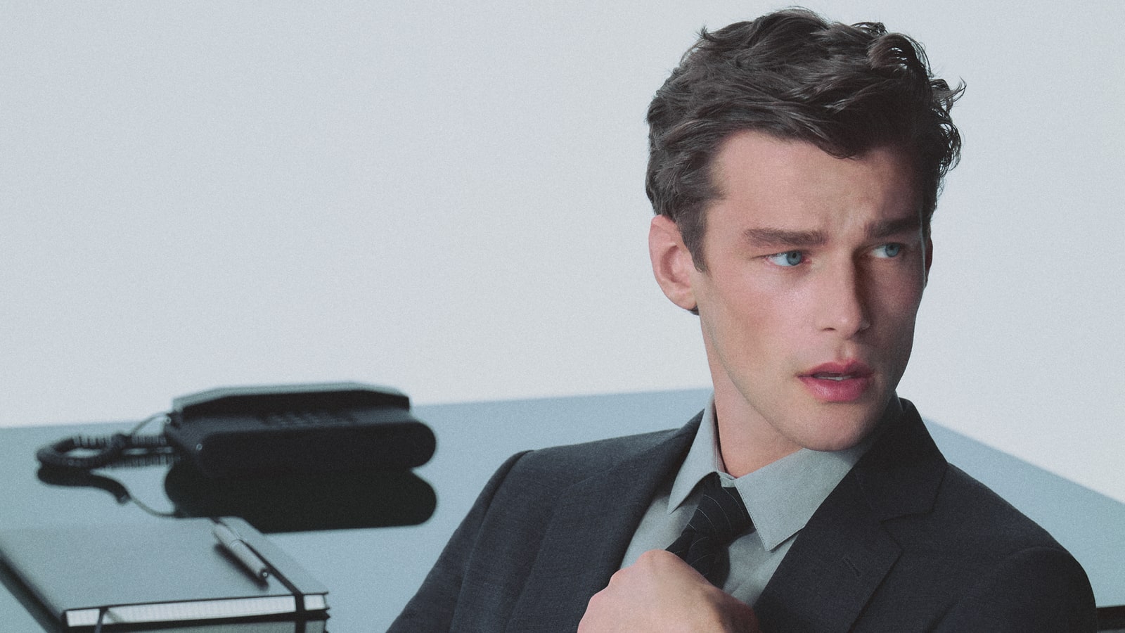 Giorgio Armani tailoring campaign showing the fluid silhouette at the center of the house.