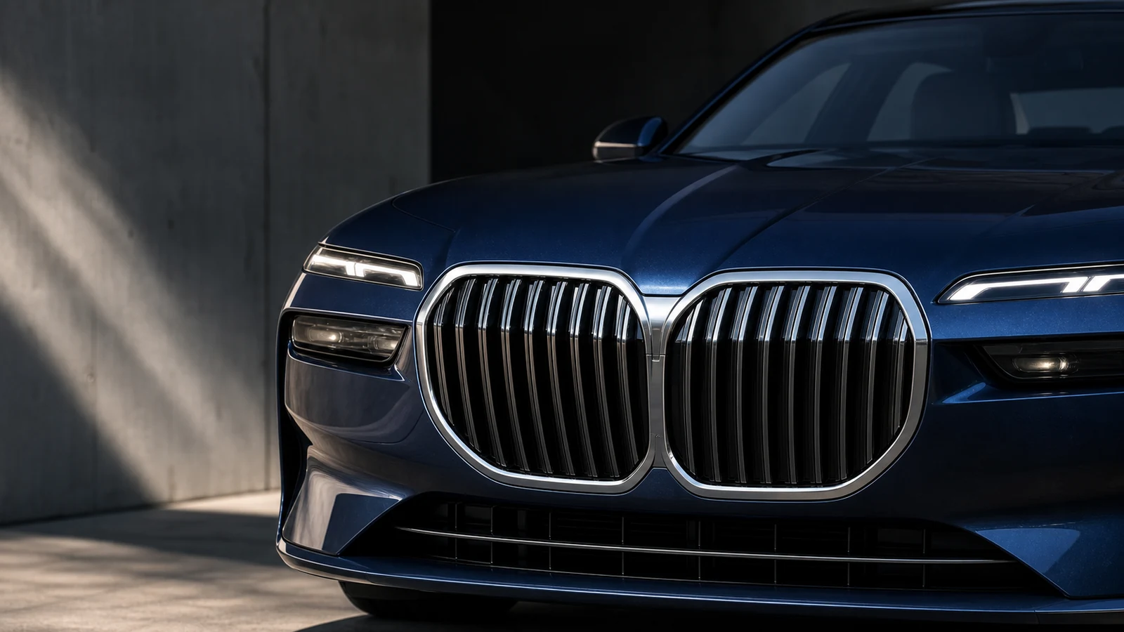 Close premium sedan grille detail without logos or license text.