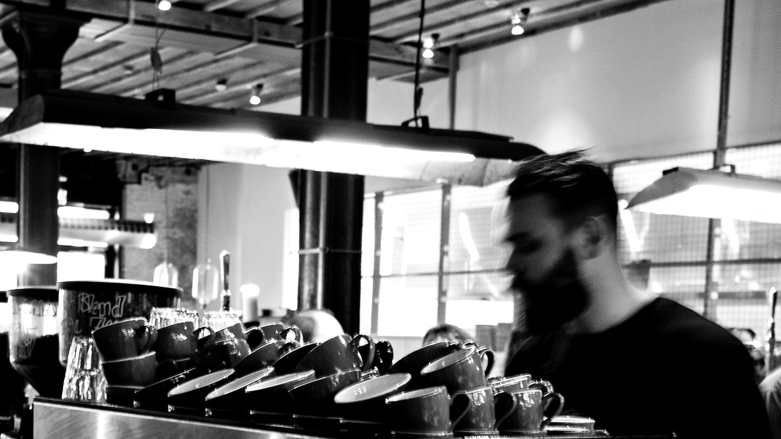 Coffee bar scene connected to La Marzocco espresso culture.