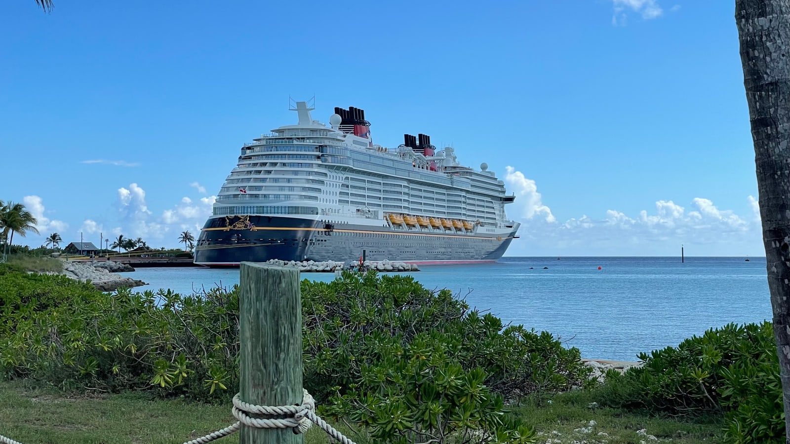Disney Wish cruise ship docked at Castaway Cay.