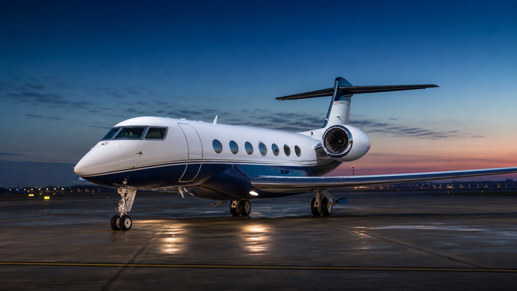 Logo-free midsize business jet on a clean apron at blue hour.