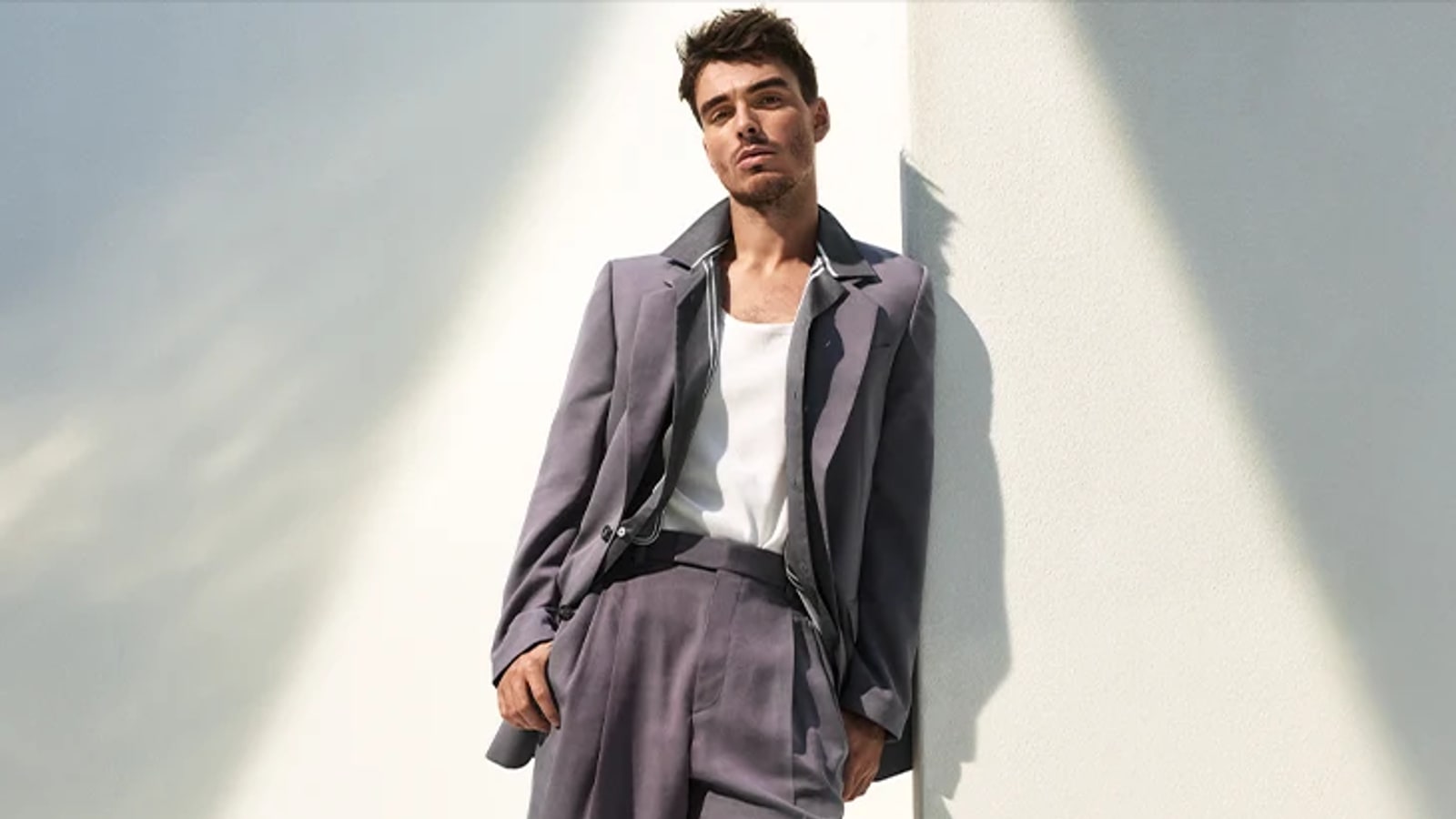 BOSS menswear campaign styling with tailored apparel.