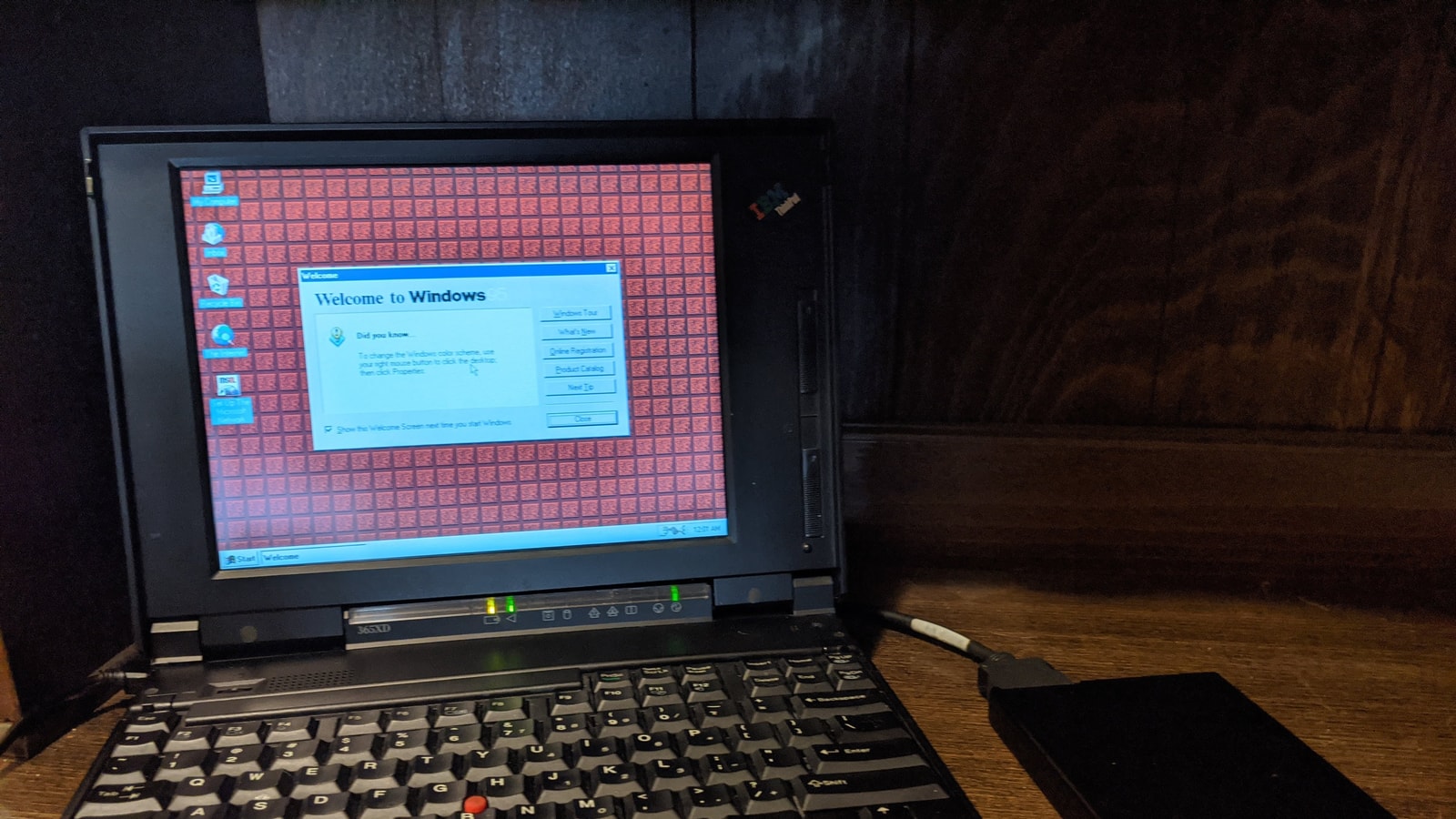 IBM ThinkPad laptop showing black-box enterprise product memory.
