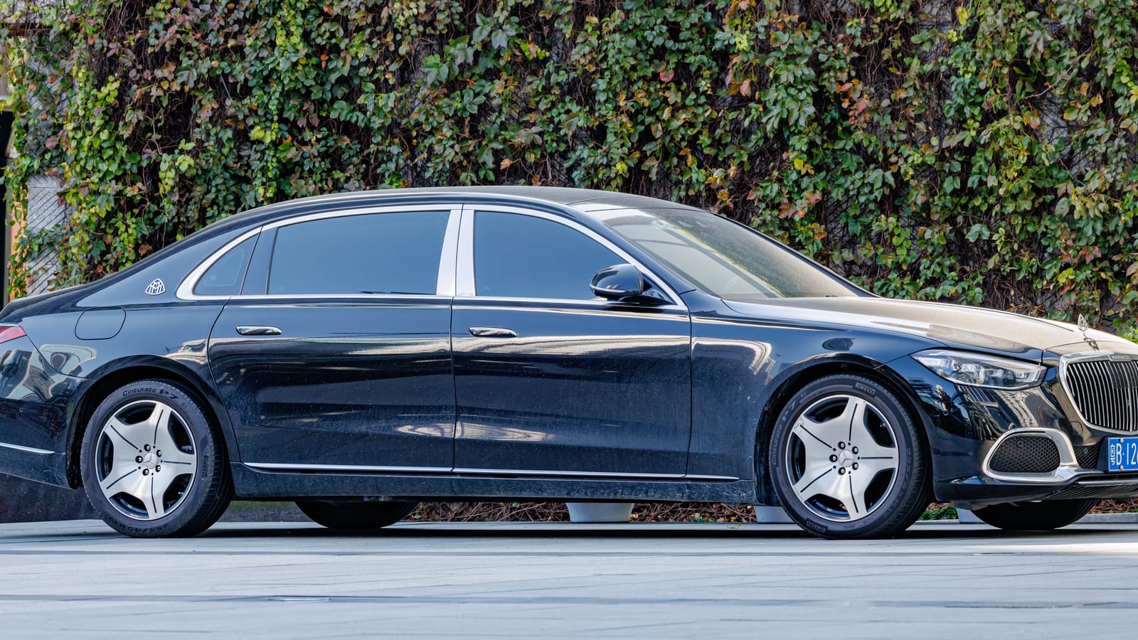 Mercedes-Maybach S-Class in a clean side view showing flagship sedan proportion and chrome restraint.