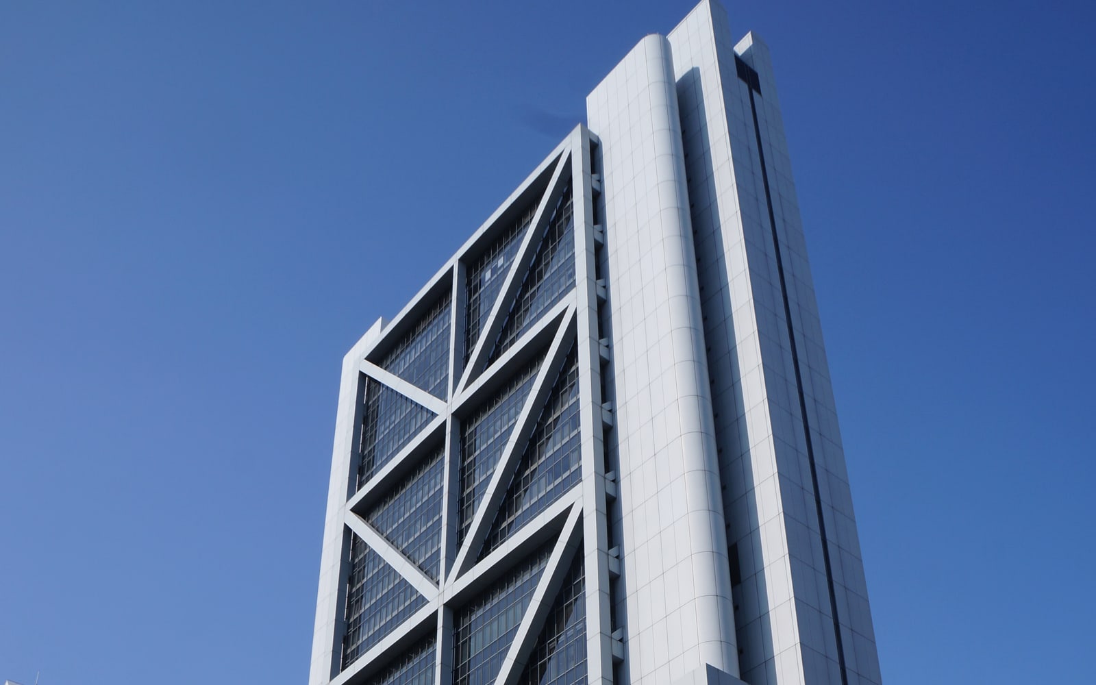 Procter & Gamble Japan headquarters tower photographed from street level.