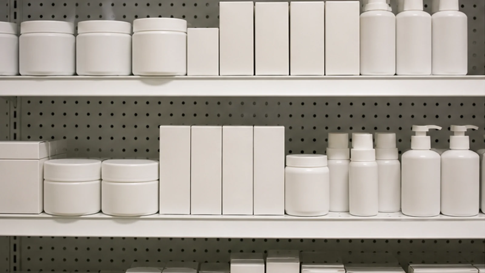 Blank generic health packaging on a drugstore shelf.