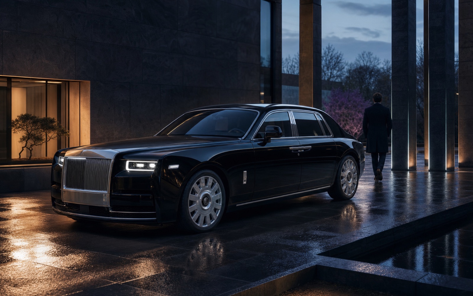 Rolls-Royce motor car in a restrained Goodwood-style setting with the Pantheon grille and Spirit of Ecstasy visible.