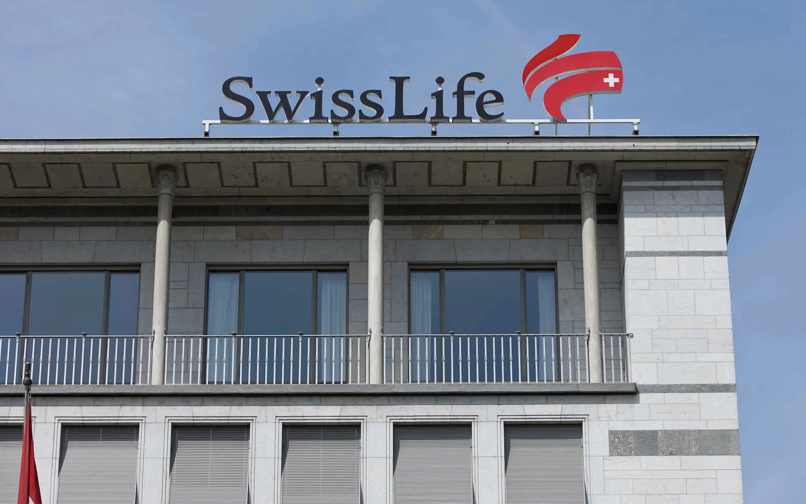 Swiss Life headquarters facade with the complete current brand lockup.