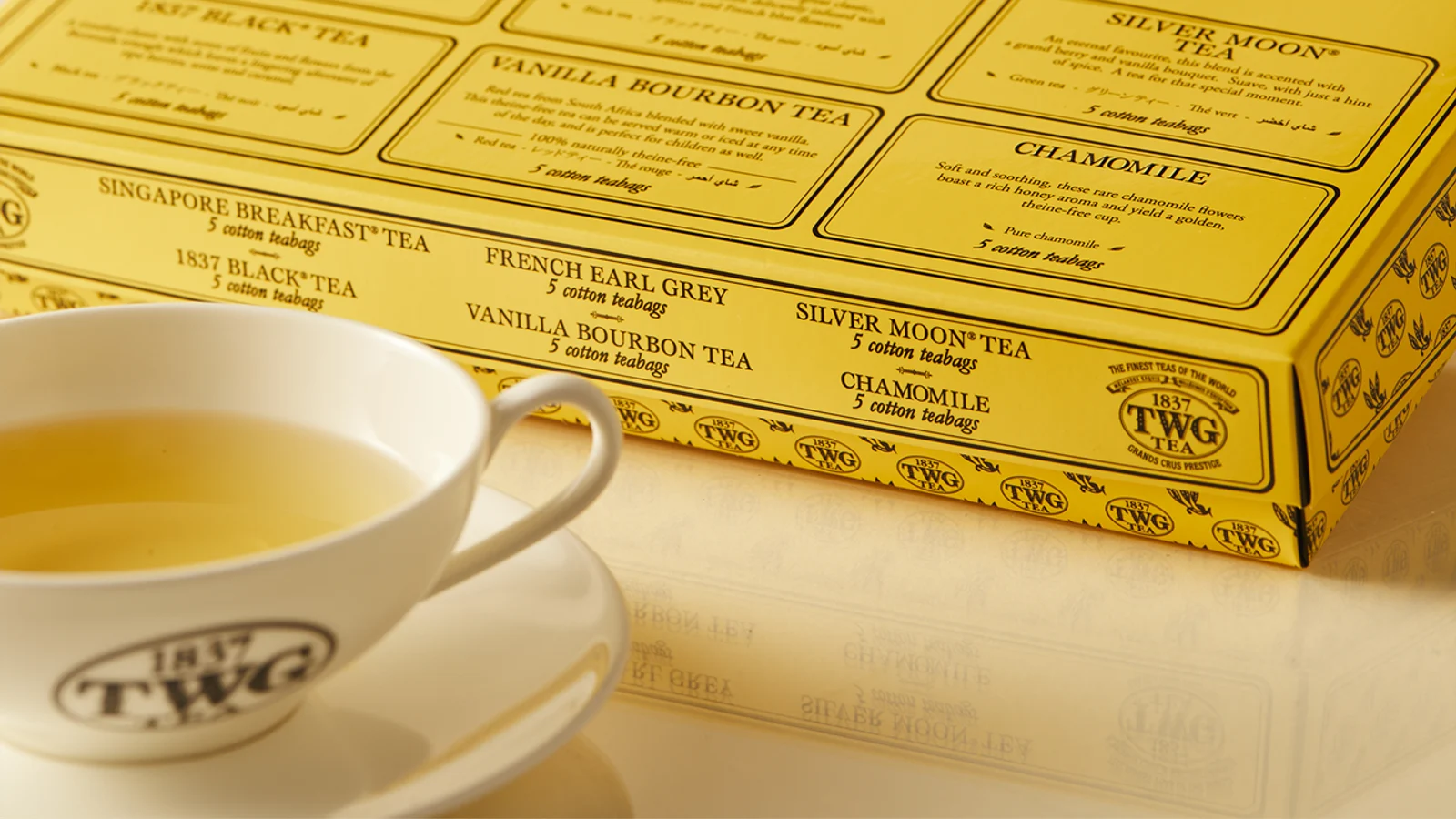 TWG Tea Taster Collection gold gift box with branded cup.