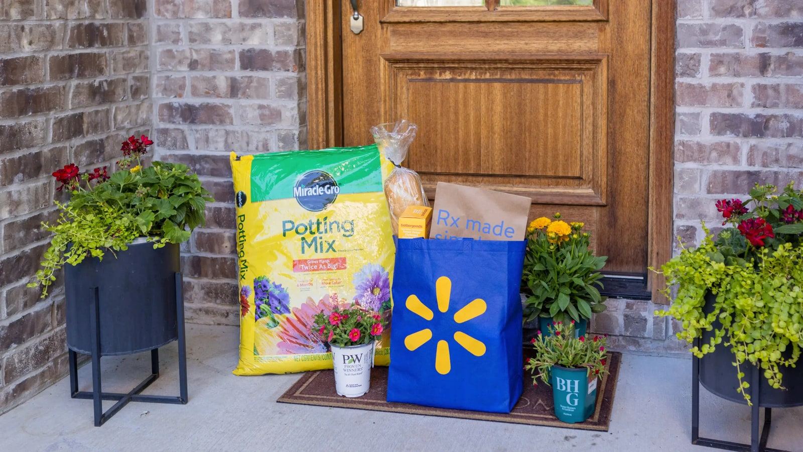 Official Walmart image showing Express Delivery groceries, pharmacy items, and garden supplies at a customer's doorstep.