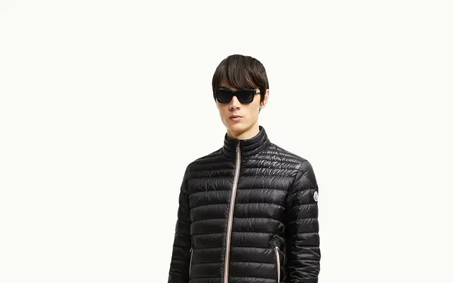 Moncler Brand Signal Card hero proof surface showing outerwear, badge recognition, and group architecture.